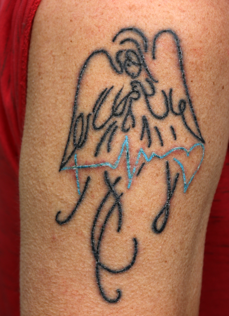 genezing tattoo